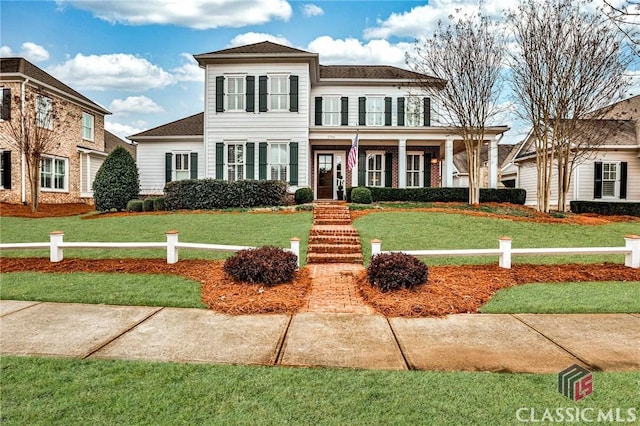 view of front of house featuring a front yard