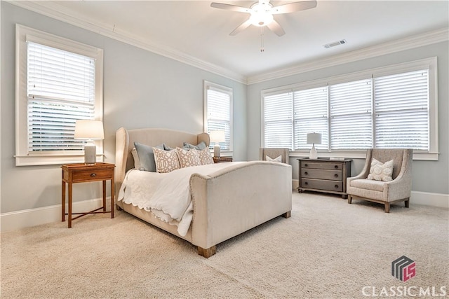 bedroom featuring multiple windows, crown molding, carpet, and ceiling fan