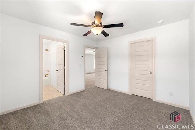 unfurnished bedroom with ceiling fan, connected bathroom, and light carpet