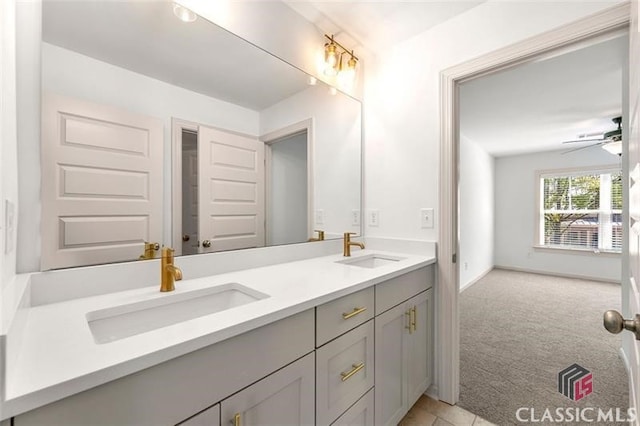 bathroom featuring vanity and ceiling fan