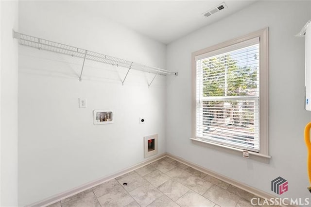 laundry room with washer hookup and electric dryer hookup