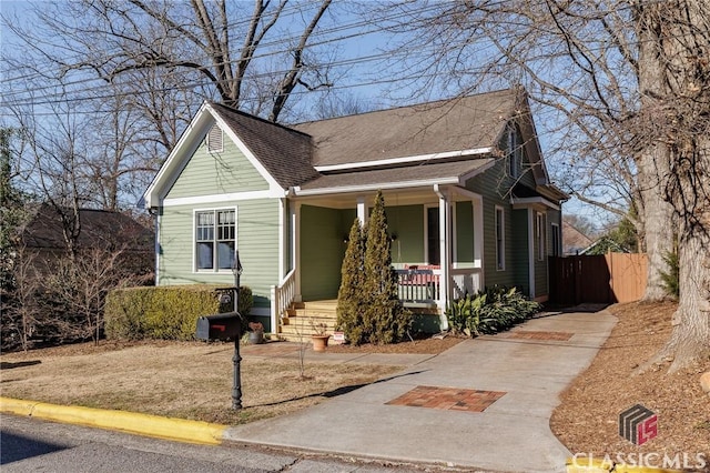 view of front of property featuring covered porch