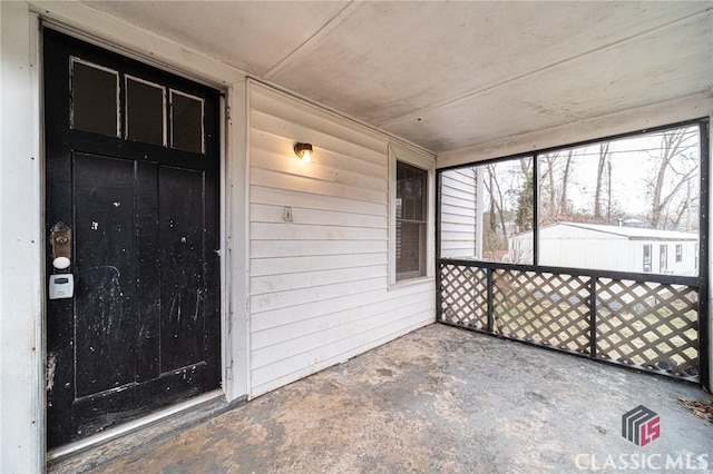 view of unfurnished sunroom