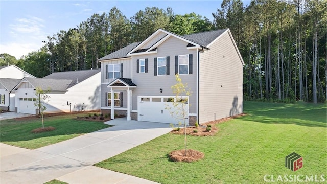 view of front of home featuring a garage and a front lawn