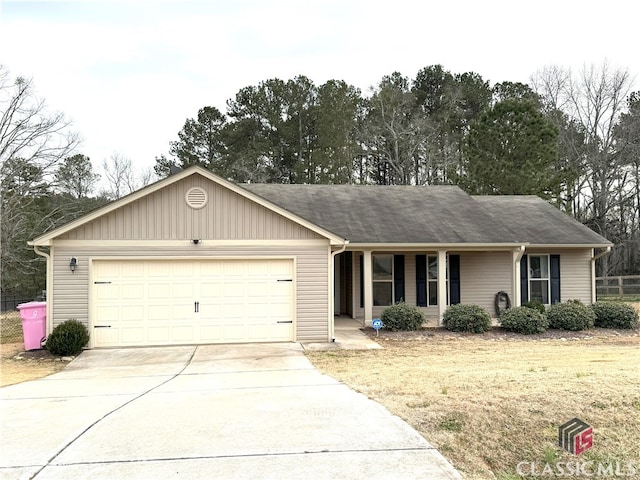 single story home featuring a garage