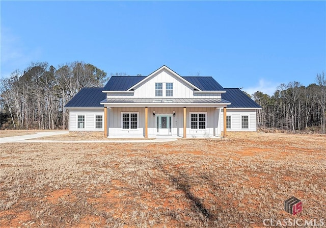 modern inspired farmhouse with covered porch