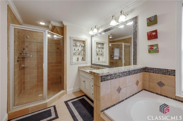 bathroom with ornamental molding, tile patterned floors, shower with separate bathtub, and vanity