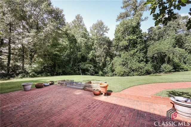 view of patio / terrace featuring a fire pit