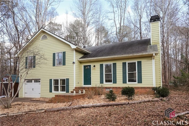 tri-level home featuring a garage