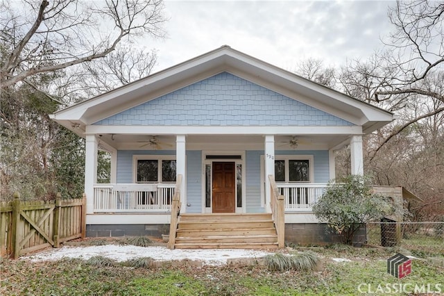 bungalow with ceiling fan and a porch