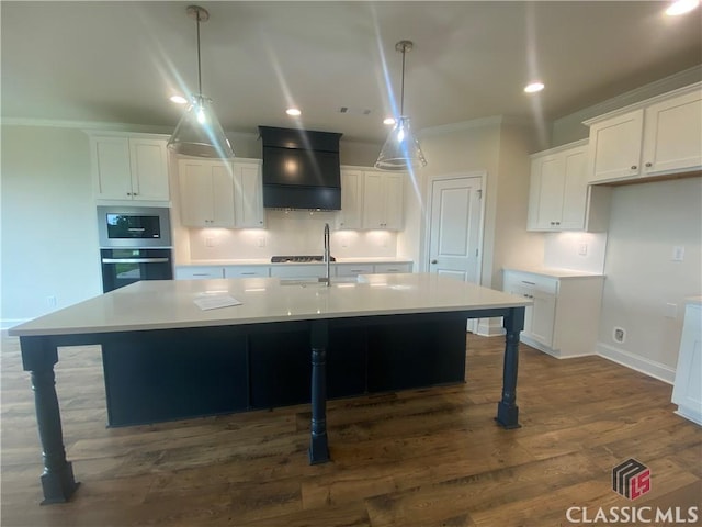226 Montview Dr, Jefferson, GA 30549 - kitchen with custom range hood, dark wood-style flooring, a large island, white cabinets, and crown molding