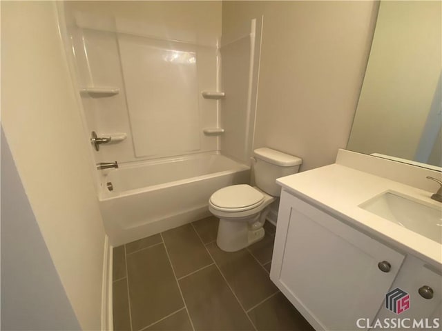 226 Montview Dr, Jefferson, GA 30549 - full bath featuring tile patterned floors, toilet, vanity, and  shower combination