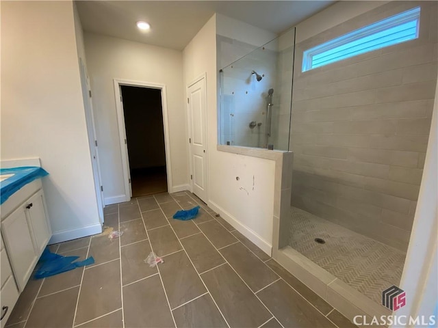 mudroom featuring baseboards and wood finished floors
