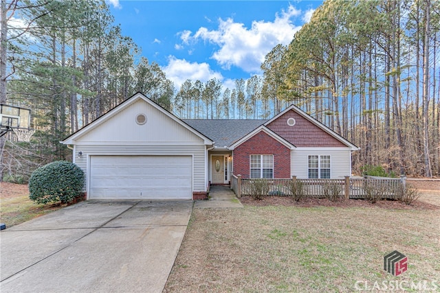 ranch-style home with a garage and a front lawn