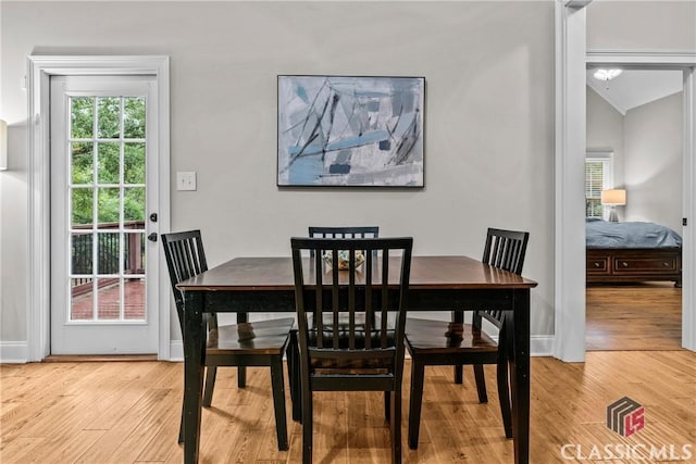 1750 Ryland Hills Dr, Watkinsville, GA 30677 - dining space featuring wood finished floors, baseboards, and a wealth of natural light