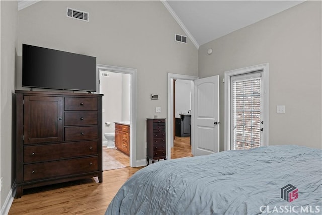 1750 Ryland Hills Dr, Watkinsville, GA 30677 - bedroom featuring light wood-type flooring, high vaulted ceiling, baseboards, and visible vents