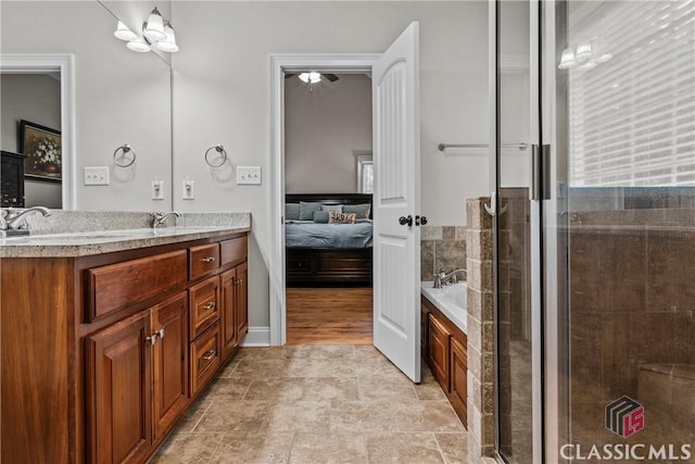 1750 Ryland Hills Dr, Watkinsville, GA 30677 - full bath with ensuite bath, a tile shower, and double vanity