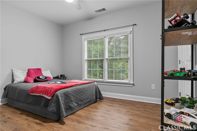 1750 Ryland Hills Dr, Watkinsville, GA 30677 - bedroom featuring wood finished floors, ceiling fan, baseboards, and visible vents