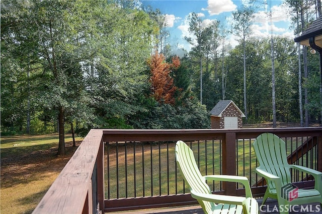 1750 Ryland Hills Dr, Watkinsville, GA 30677 - wooden terrace featuring a storage unit, an outdoor structure, and a lawn