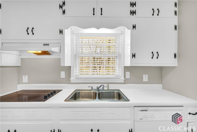 kitchen with white cabinetry, sink, black electric stovetop, and white dishwasher