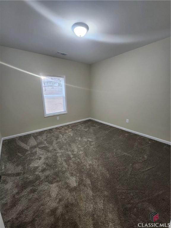 empty room with carpet floors