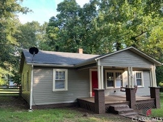 bungalow featuring a deck