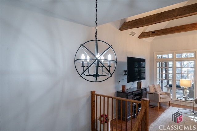 staircase with hardwood / wood-style flooring, a chandelier, and vaulted ceiling with beams