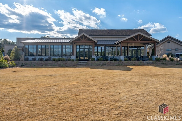 view of community featuring a lawn