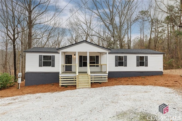 manufactured / mobile home featuring covered porch