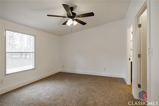 unfurnished room featuring carpet floors and ceiling fan