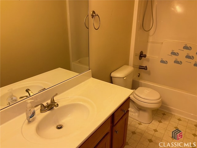 full bathroom with bathtub / shower combination, vanity, and toilet