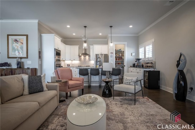 living room featuring crown molding and dark hardwood / wood-style floors