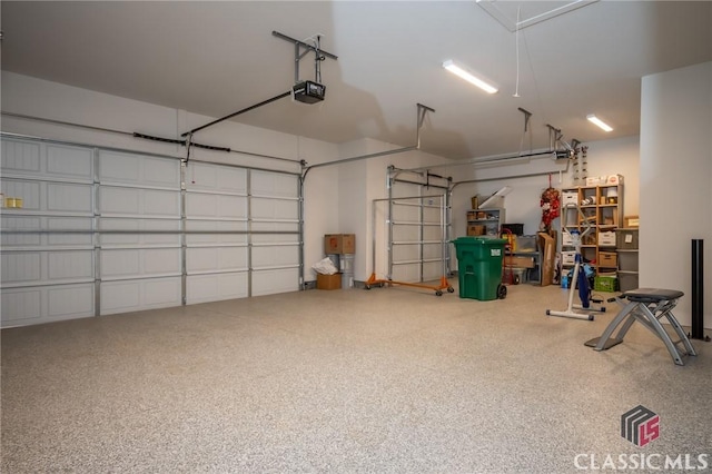 garage featuring a garage door opener