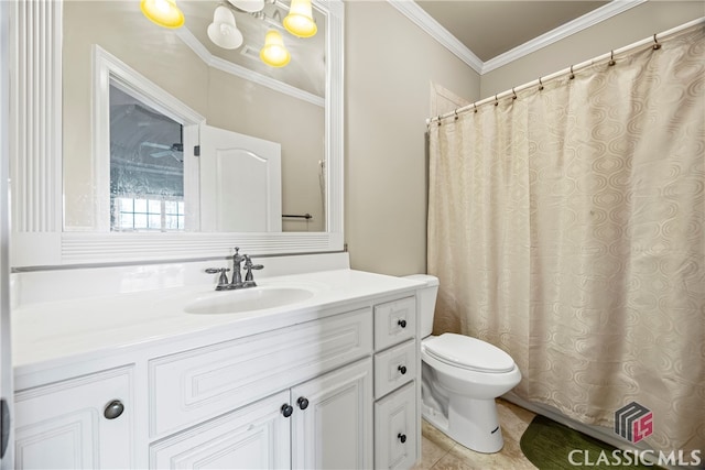 bathroom with ornamental molding, toilet, and vanity