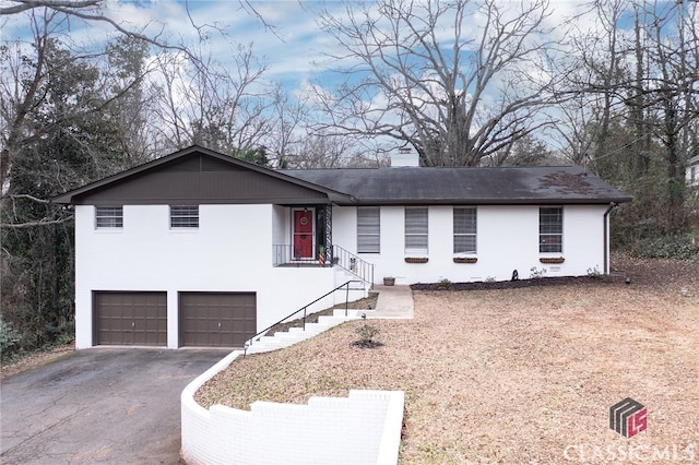 ranch-style home with a garage