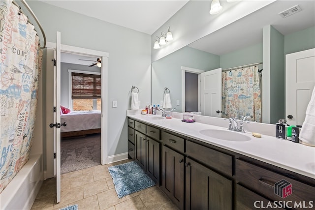 bathroom with tile patterned flooring, vanity, shower / bath combination with curtain, and ceiling fan