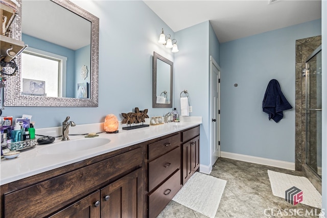 bathroom with vanity, tile patterned flooring, and walk in shower