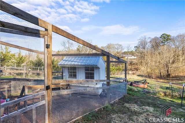 exterior space featuring an outbuilding