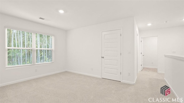 view of carpeted spare room