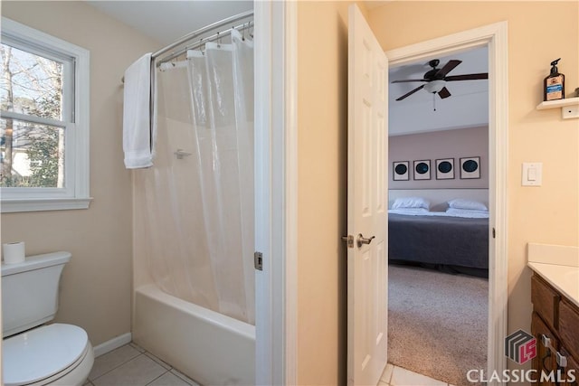 full bathroom featuring shower / tub combo, vanity, toilet, and tile patterned flooring