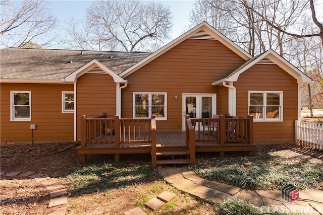 rear view of house featuring a deck