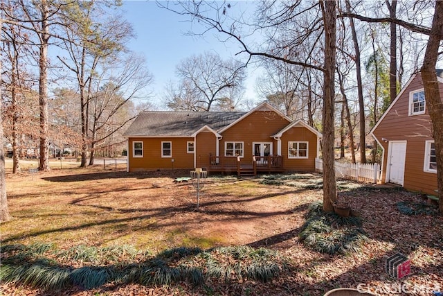 rear view of property with a deck