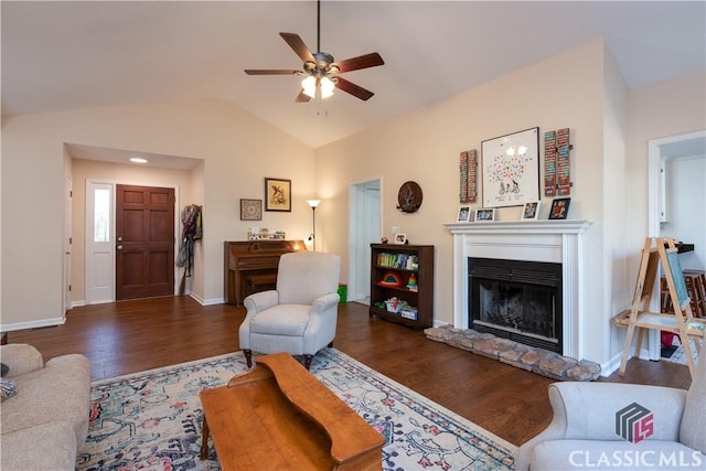 living room with ceiling fan, lofted ceiling, and dark hardwood / wood-style floors