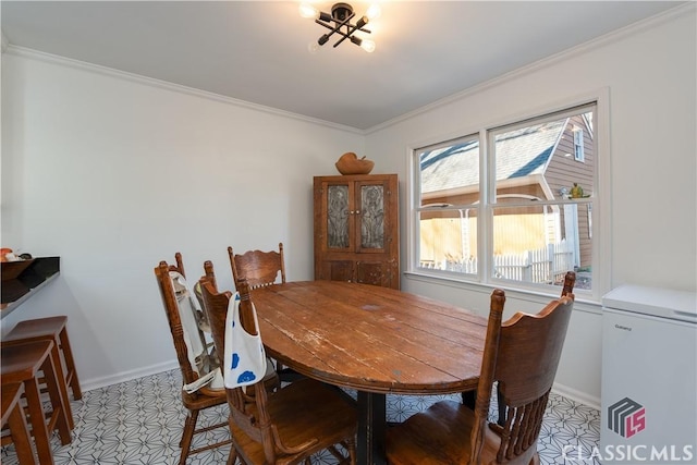 dining room with crown molding