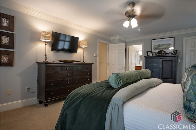 carpeted bedroom featuring ornamental molding and ceiling fan