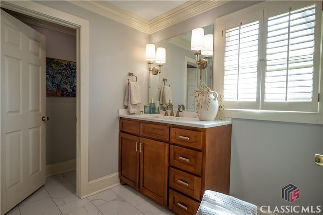 bathroom featuring ornamental molding and vanity