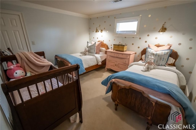 bedroom featuring crown molding and carpet flooring