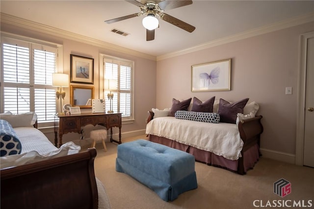 carpeted bedroom with crown molding, ceiling fan, and multiple windows