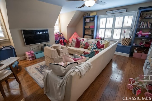 living room with hardwood / wood-style floors and ceiling fan