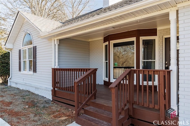 property entrance featuring a porch